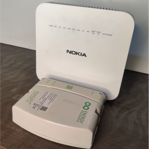 Energy Intelligence router ups next to a nokia router