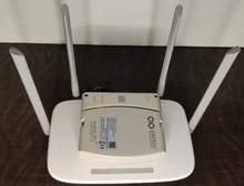 Energy Intelligence router UPS on top of router to compare size