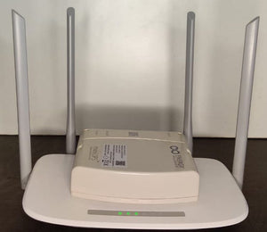 Energy Intelligence router ups on top of  tp-link router to compare size