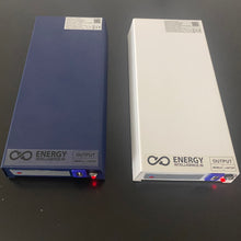 Load image into Gallery viewer, Blazing Blue and Winter White Laptop Power Bank from Energy Intelligence. Shown powered on
